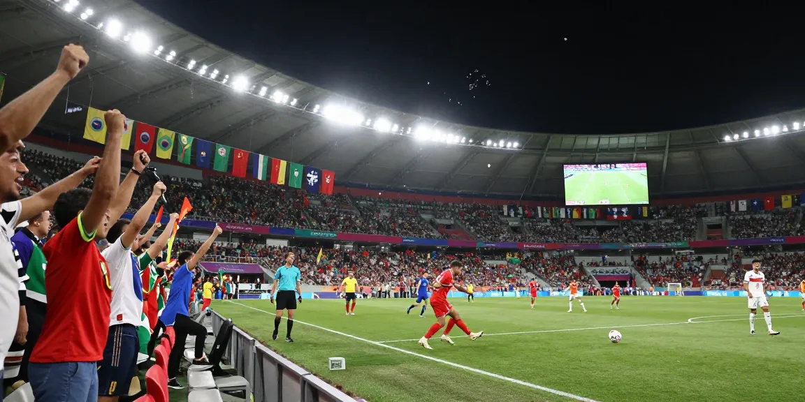 Jadwal Piala Dunia 2026: Suasana stadion sepak bola yang ramai saat pertandingan besar.